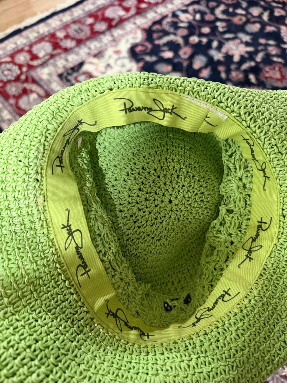 green woven straw sun hat by Panama Jack